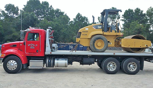 Holt's Truck Hauling Heavy Machinery